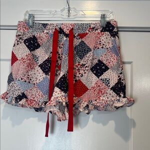 Luxx Floral Patchwork Fabric shorts with ruffle design size large.